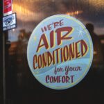 "We're Air Conditioned for your Comfort" Sign