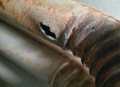 Heat exchanger with rust and crack in it